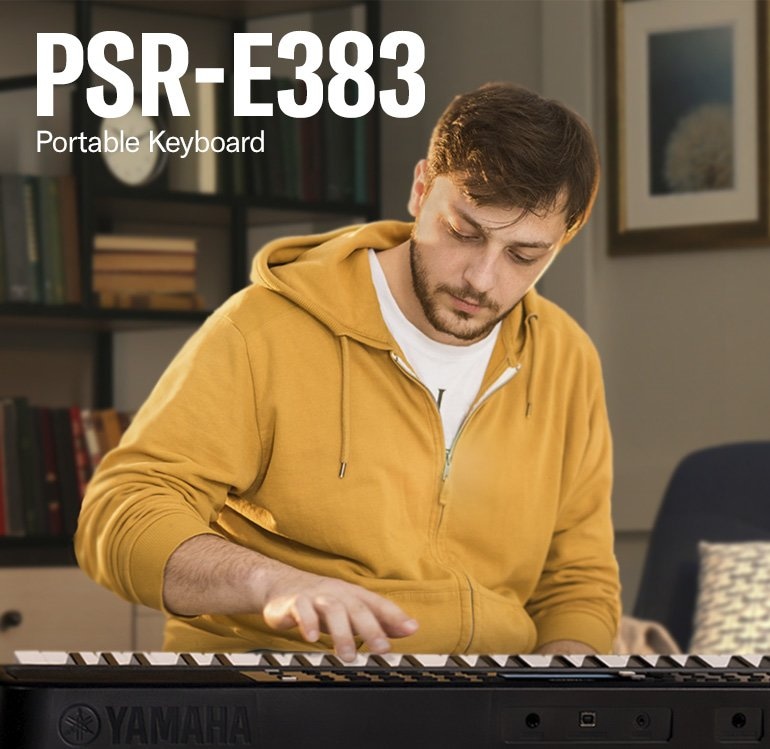 The man is playing the PSR-E383 enthusiastically.