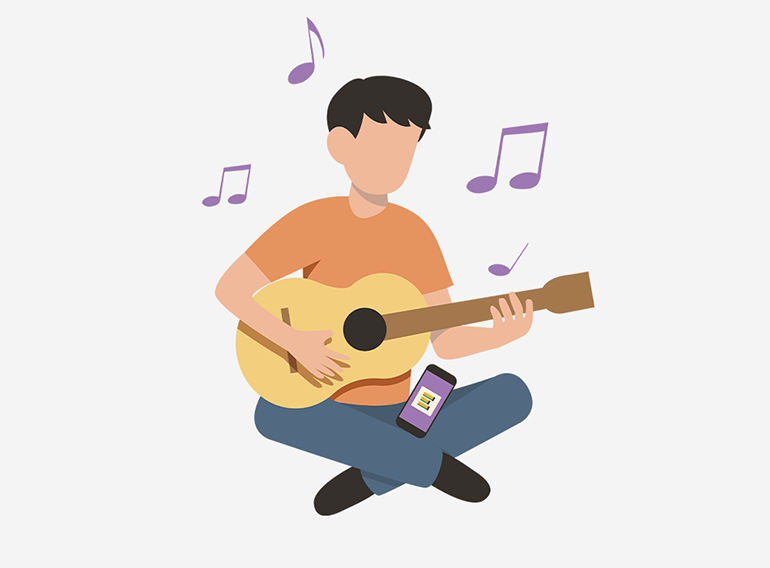 Extrack 음악 연습 앱을 사용하여 코드 악보를 보며 연습하고 있는 남성